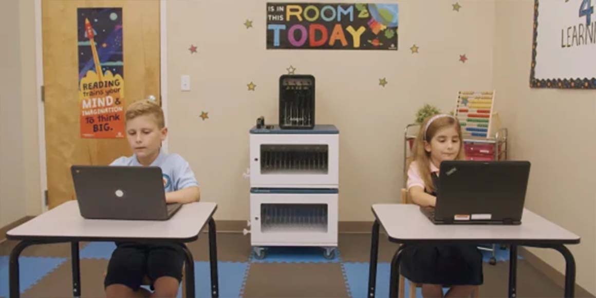 A chromebook charging station in a classroom.