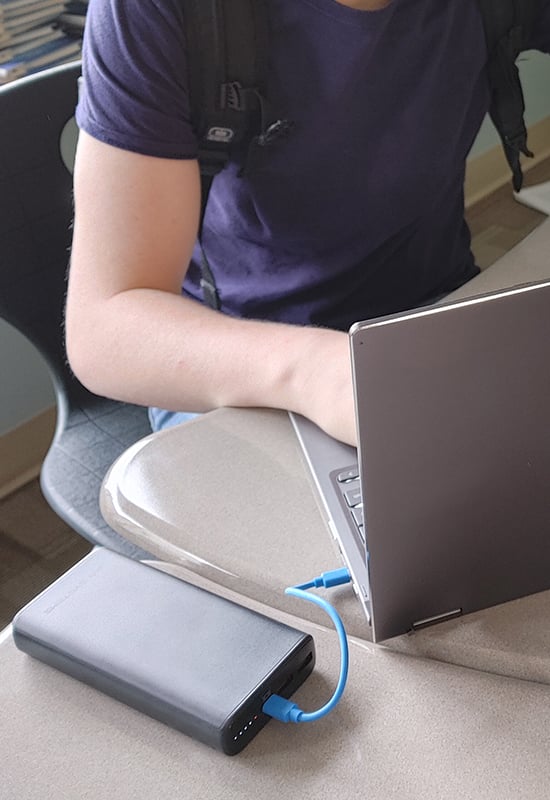 Student Actively Charging at Their Desk