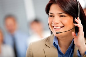 Business woman at the office wearing a headset