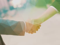 Double exposure design. Business partners concept with businessman and businesswoman handshake at modern office indoors-2
